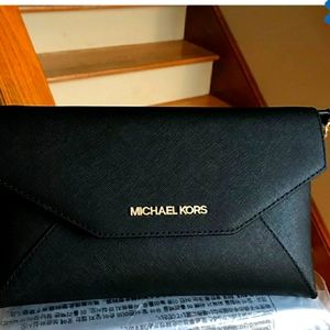 mk envelope clutch